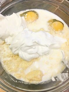 eggs and cream in a bowl on a table