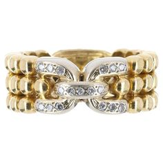 This is a unique, well made, two-toned gold diamond belt band ring. The handmade ring is solid 18k white/yellow gold. This amazing ring is encrusted with approximately 0.17tcw of 17 natural white diamonds, SI clarity & H-I color. The ring is size 7, can be resized free of charge. Hallmarked and tested as 18K white and yellow gold. Get this amazing band while listing lasts! Setting Style: Band Setting Material: 18K White & Yellow Gold / Grams Main Stone: Diamond Approx Weight: 0.17pts Shape: Round Cut Cut: Very Good Clarity: SI1 Color: H-I Luster: Very Good Treatment: Genuine Pave Ring Band, Diamond Infinity Band, Thick Gold Band, Infinity Band Ring, Diamond Belt, Mens Diamond Wedding Bands, Tanzanite Diamond Ring, Diamond Stacking Rings, Pave Diamond Ring