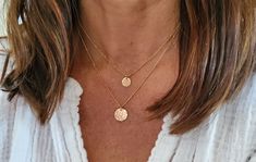 "This small gold fill necklace is perfect for layering! The 12mm gold fill charm is hammered to give a fun effect and shown here hanging from a 18inch gold fill satellite chain, layered on bottom, with our tiny 9mm version on top in 15\" length. Can also be made in sterling silver. *If you are unsure of the length you need or would like to wear this item at different lengths, we now offer an adjustable length option! You can add an adjustable end to your necklace using this link: https://www.ets Minimalist Layered Necklace With Adjustable Chain, Minimalist Round Layered Necklace With Delicate Chain, Delicate Round Charm Necklaces For Layering, Dainty Round Charm Necklaces For Layering, Dainty Layering Charm Necklaces, Dainty Round Necklaces For Layering, Dainty Round Layered Necklace, Everyday Round Charm Necklace With Satellite Chain, Dainty Round Charm Necklace With Satellite Chain