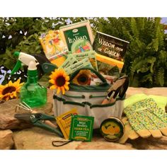 a basket filled with gardening supplies sitting on top of a rock