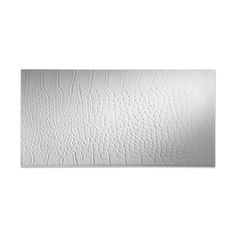 an image of white textured paper on the wall