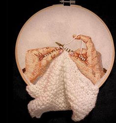 a close up of a hand embroidery on a hoop