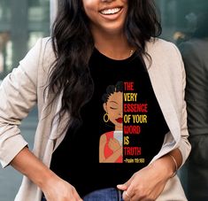 a woman wearing a t - shirt that says the very essence of your world is truth