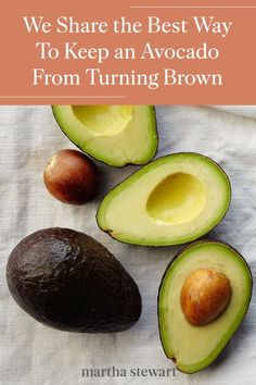 an avocado cut in half with the words we share the best way to keep an avocado from turning brown