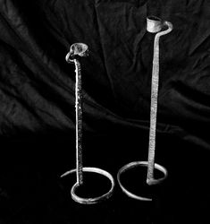 This pair of vintage candlestick holders were carefully and expertly hand-forged in a minimalist style, showcasing the bare and exposed material of wrought iron to create the spiral shape (also known as Brutalist style). The bare iron in the shape of a spiral creates a raw and edgy, yet simple and honest look that adds unique character to a home's decor, a party, as a centerpiece or as a new addition to an enthusiast's collection. These art pieces were crafted by an anonymous metalsmith. The pair are different in size. the first measures 11 inches tall and the second measures 12.5 inches tall. Both are about 4.5 inches wide. Pairs similar are currently selling between $165-$235. These are in excellent condition and have been used. They both have wax drips. I decided not to clean the wax an Spiral Candle, Spiral Candles, Vintage Candlestick Holders, Candle Stick Holders, Vintage Candlesticks, Spiral Shape, Iron Art, Candlestick Holders, Hand Forged