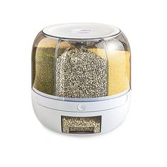 a food dehydrator with various grains and seasonings in it on a white background