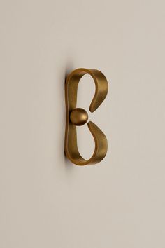 the letter b is made out of brass