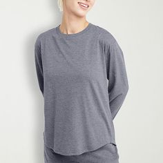 Basics that are far from basic. This relaxed, long-sleeve Hanes originals women's tee is made with our oh-so-soft tri-blend fabric formula for all-day comfort. Lightweight enough to wear in the summer, it's also perfect for layering up on a chilly day. A set-in ribbed crewneck, curved hem, and center back seam elevate the look. Pair it with everything from sweats to shorts and jeans for a look that never goes out of style.Be yourself in Hanes originals - a stylish collection of cool, modern essentials designed for comfort, made for every body.Design details - long-sleeve tee with set-in ribbed crewneck, curved hem with cover stitching, and center back seam.Hanes quality - double-needle stitching at the sleeve opening and hem.Fits just right - comfy and relaxed fit for easy movement.A dream Body Design, Large Shirts, Be Yourself, A Dream, Shirt Shop, Design Details, Long Sleeve T Shirt, Womens Tees, Shirts Tops