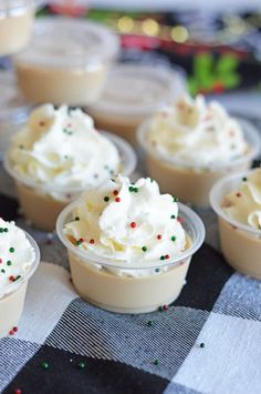 small cups filled with whipped cream and sprinkles