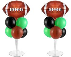 two footballs and balloons on top of each other