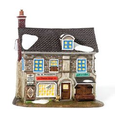 a small toy house is shown on a white background