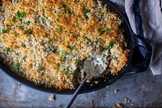 a casserole dish with meat and cheese on it, ready to be eaten