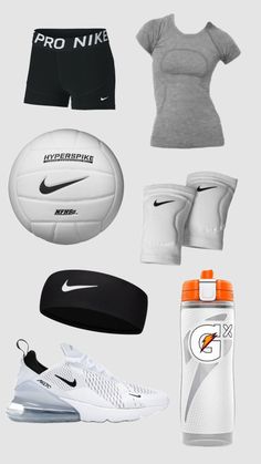 various sports items are arranged on a gray background, including shorts, t - shirt and water bottle