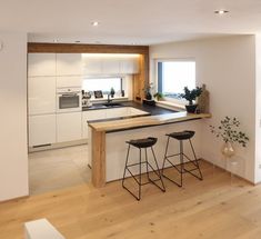 the kitchen is clean and ready to be used as a dining room or living area