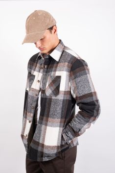 Nothing says cooler temps then our Sherpa Lined Flannel Shacket. Constructed of quilted flannel, this heavyweight style is perfect for days when you need to keep warm while looking chill. What is a SHACKET? A Shacket is a blend of a shirt and jacket, except it’s a bit oversized and looks like a shirt but made from a heavier material And while the heavier material helps distinguish the shacket piece of outerwear from a shirt, it’s not fully a jacket. STYLE: BKME262F Content + Care Flannel Shacket Flannel Shacket, Navy And Brown, Sherpa Lined, Jacket Style, Keep Warm, Shoulder Sleeve, Black And Brown, Brooklyn, Fitness Models