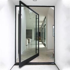 gloryirondoors home type black iron pivot door with clear glass Pivot Doors Entry, Hall Door, Door Architecture, Pivot Door, Modern Entry, Entry Design, Glass Walls, Glass Front Door