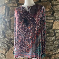 Soft, Fluid Multi-Colored Floral Print Tunic With Long Tasseled Ties At Neck. 100% Viscose Silk. Hand Wash. Do Not Dry Clean. Red Tassel Tops For Beach, Red Tassel Beach Tops, Casual Red Tassel Top, Casual Red Tops With Tassels, Floral Print Tunic, Linen Lights, Orange Sweaters, Cold Shoulder Blouse, Boho Tunics