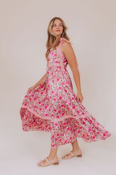 Flaunt a little love in the Kiss Of Life Dress. Its tie lace straps and elastic back make it the perfect fit. With a delicate floral print and lace details, this dress exudes charm and style. Your go-to for effortless elegance. Details Tie lace straps Floral print Lace details Elastic on the back Sizing Approximate measurements: SIZE LENGTH BUST Small 47" 34" Medium 47" 38" Large 49" 40" Fabric has some stretch in the bodiceModel is 5’9 wearing small Material Self 100% PolyesterLining 95% Polyes Beach Dress With Lace And Ruffled Straps, Lace Beach Dress With Ruffled Straps, Pink Dress With Lace Trim And Ruffled Straps, Feminine Dresses With Lace Trim And Ruffled Straps, Sleeveless Lace Dress With Smocked Back, Lace Dresses With Adjustable Straps For Garden Party, Summer Dresses With Lace Trim For Garden Party, Lace Dress With Tie Back For Garden Party, Pink Tie-back Sundress For Garden Party