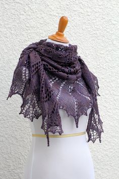 Knit shawl, lace shawl made of 100% wool yarn in lovely red violet color. Perfect gift for her, gift for mom!It's perfect with an elegant dress and also with jeans or shirt and there is a lot of ways to wear it.This hand knit shawl is very light and delicate.Measures: spreads: 72 inches height: 40 inches Hand wash and dry flat. Block it if you can.Shown color: ClematisThis yarn is heather which means there are few different colors mixed in a thread. Red Violet Color, Poncho Wrap Pattern, Bridesmaid Shawl, Hand Knit Shawl, Knit Shawl, Red Violet, Violet Color, Wrap Pattern, Wedding Shawl