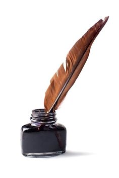 a feather quill sitting on top of a black ink bottle next to a brown pen