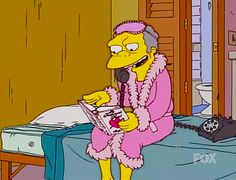 the simpsons is sitting on his bed and talking on the phone while wearing a pink fur coat