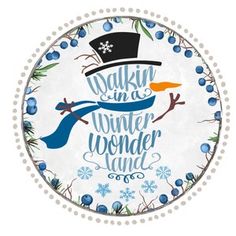 a white plate with a blue and orange snowman on it's side that says, dakin in a winter wonderland land