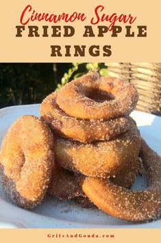 cinnamon sugar fried apple rings on a white plate with text overlay that reads cinnamon sugar fried apple rings