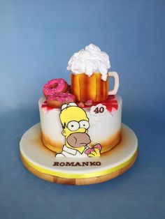 a cake decorated with the simpsons character and doughnuts