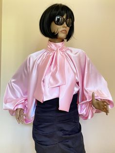 "This is a very stylish Womens Satin blouse. It is comfortable and cozy. Made for a free flowing fit. Great for all year around and for any special occasion or casual day can be dressed up or dressed down. SIZE CHART SIZE S - US 6, UK 8, EU 36 bust: bust around 34.5\"/90cm Waist: waist around 27.5\"/70cm Hips: hips around 34.5\"/90cm SIZE M - US 8, UK 10, EU 38 bust: bust around 37.5\"/95cm Waist: waist around 29.5\"/75cm Hips: hips around 37.5\"/95cm SIZE L - US 10, UK 12, EU 40 bust: bust arou Fall Pink Puff Sleeve Blouse, Pink Puff Sleeve Blouse For Fall, Elegant Pink Tops For Evening, Feminine Party Tops With Bow Detail, Fall Puff Sleeve Blouse With Bow Detail, Fall Puff Sleeve Blouse With Bow, Feminine Party Blouse With Bow, Elegant Pink Evening Tops, Glamorous Spring Blouse With Blouson Sleeves