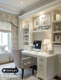 a home office with built - in shelving and desk