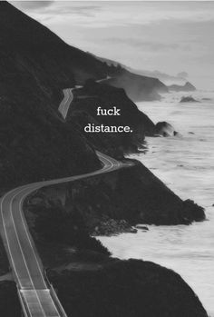 a black and white photo with the words truck distance on it's side next to an ocean