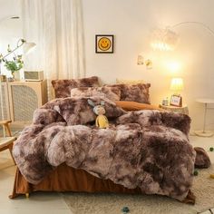 a bedroom with a bed covered in brown fur