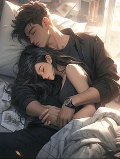 a man and woman laying on top of a bed next to each other with their eyes closed