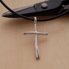 A minimalist sterling silver cross pendant necklace for men that shows his commitment to Lord while making the perfect accent for his hand-tailored suit. What makes it most unique, is that it has a primeval vibrancy that is dramatically striking. Ideal to wear every day, it looks great with everything and might just become your signature staple accessory. Give the gift of love and light with this original City Lights Jewellery creation. Order now to guarantee availability. Cross measures 4cm x 2 Modern Crucifix Cross Necklace As Gift, Modern Crucifix Necklace As Gift, Minimalist Sterling Silver Crucifix Necklace, Adjustable Minimalist Cross Necklace, Modern Sterling Silver Cross Pendant, Modern Sterling Silver Cross Pendant Jewelry, Modern Cross Necklace As A Gift, Minimalist Adjustable Cross Pendant Necklace, Simple Sterling Silver Cross Pendant Necklace