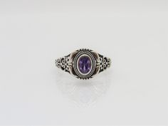 Vintage Sterling Silver Amethyst Dome Ring ...Marked 925...Total of weights 2.5grams...Size 7...Measure of Face 10.9MM...It's in very good condition. Vintage Purple Sterling Silver Ring, Classic Purple Rings Stamped 925, Vintage Oval Amethyst Ring Stamped 925, Vintage Oval Amethyst Ring, Solitaire Rings, Dome Ring, Amethyst Gem, Purple Band, Filigree Ring