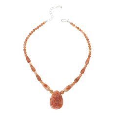 Jay King Sterling Silver Tanzanian Red Sunstone Necklace Multi-shaped Tanzanian sunstone beads display mottled shades of orange and red to create a fun, colorful jewelry accessory that's easy to dress up or down. From Jay King.       Approx. 18-1/4"L x 3/8"L with 2-3/4" extender     Stamped .925     Hook closure     Necklace features pear-shaped center drop of orange/red sunstone      Round and elongated sunstone beads complete necklace   Stone Information       All sizes and weights approximate     Stabilized Clarity-Enhanced Orange-Red Sunstone - Freeform (28x41mm, 8x18mm to 10x24mm), round (6-8mm); mined in Tanzania Adjustable Orange Gemstone Beaded Necklace, Sunstone Necklace, Jewelry King, Necklace Stone, Color Bands, Colorful Jewelry, Beading Wire, Shades Of Orange, Tanzania