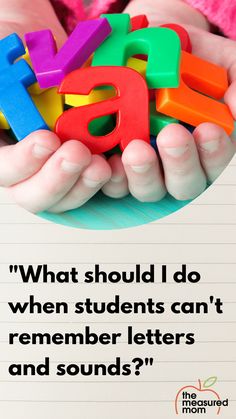 a child holding colorful letters with the words what should i do when students can't remember letters and sounds?