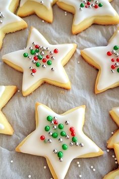 decorated cookies are arranged in the shape of stars