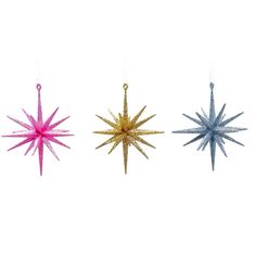 three star ornaments hanging from strings on a white background