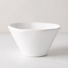 a white bowl sitting on top of a table