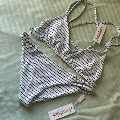 New With Tags Frankies Bikinis Kaia Set White With Blue Stripes Size Medium Top And Bottom No Flaws Striped Swimwear For Spring Beach Outing, Spring Striped Tankini For Poolside, White Strappy Swimwear For Beach Season, Spring Striped Swimwear For Beach, Spring Striped Swimwear For The Beach, Spring Beach Striped Swimwear, Spring Beach Swimwear In Striped Color, Striped Swimwear With Lined Body For Poolside, Striped Swimwear With Lined Body For Vacation