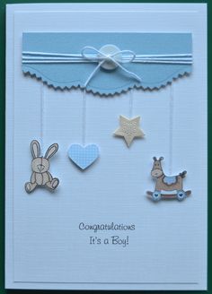 congratulations card for its a boy with baby's toys