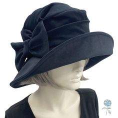 "Get ready to step back in time with a vintage-inspired wide brim cloche hat, reminiscent of the 20's and 30's! It's like you're a character from Downton Abbey or Boardwalk Empire! Say goodbye to winter blues and hello to a couture hat that's both gorgeous and comfortable to wear. The Alice, with its unique styling, offers plenty of room in the crown, so you won't have to worry about hat-hair when taking it off. Plus, it's made with a beautifully soft, luxurious black velvet that's warm and divi Newsboy Cap Women, Black Wide Brim Hat, Cute Beret, Red Berets, Hat With Bow, Unique Styling, Couture Hats, Hat Hair, Hats Women