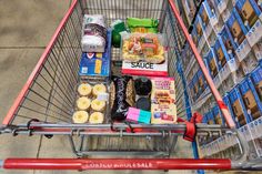 a shopping cart filled with lots of food