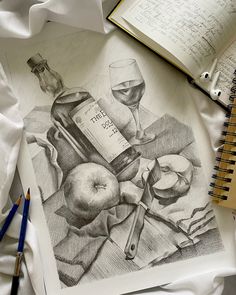 a pencil drawing of an apple and wine bottle on top of a table next to a book