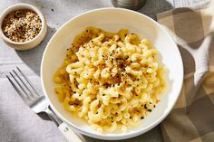 a white bowl filled with macaroni and cheese