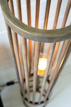 a light that is inside of a wooden basket