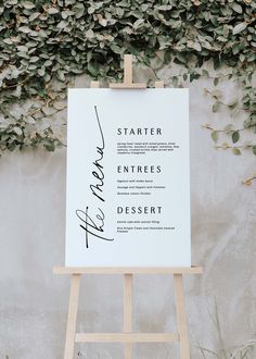 an easel with a sign that says startner, entrees and dessert