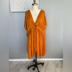 Good Condition Mannequin Is 57 Inches From Floor Length To Shoulder For Reference Pit To Pit Measurement Is 24in E94-19 Orange Rayon V-neck Dress, Orange V-neck Rayon Dress, V-neck Rayon Mini Dress For Daywear, Orange Midi Dress, Anthropologie Dress, Anthropology, Anthropologie Dresses, Color Orange, Floor Length