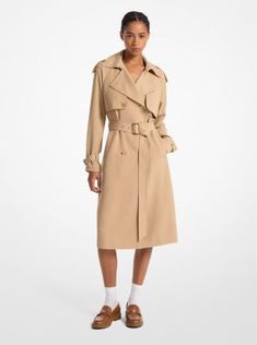 Transitional weather calls for chic layering styles that provide just the right amount of warmth. This trench coat features an array of functional details, such as a double-breasted closure, handy pockets, and an adjustable belt to cinch the waist. Wear yours with a dress and heels for desk-to-dinner plans. Spring Double-breasted Outerwear With Belted Cuffs, Fall Outerwear With Belt Loops, Fitted Outerwear With Belted Cuffs For Fall, Fitted Fall Outerwear With Belted Cuffs, Spring Workwear Outerwear With Belted Cuffs, Winter Gabardine Outerwear With Belted Cuffs, Fitted Gabardine Belted Outerwear, Spring Gabardine Outerwear With Belt Loops, Fall Gabardine Belted Outerwear